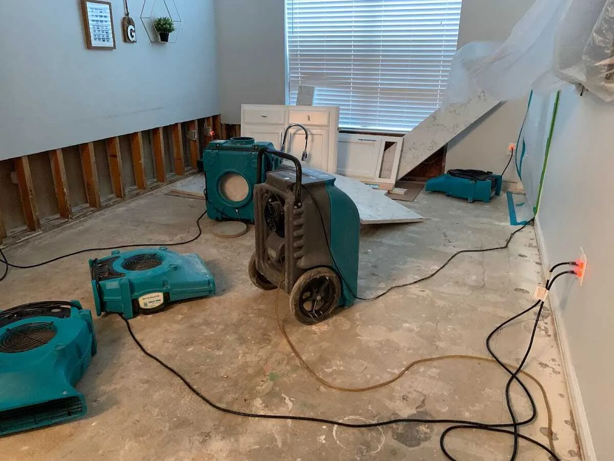 Dehumidifier in flood-cut room for Water Damage Restoration in Perry Heights
